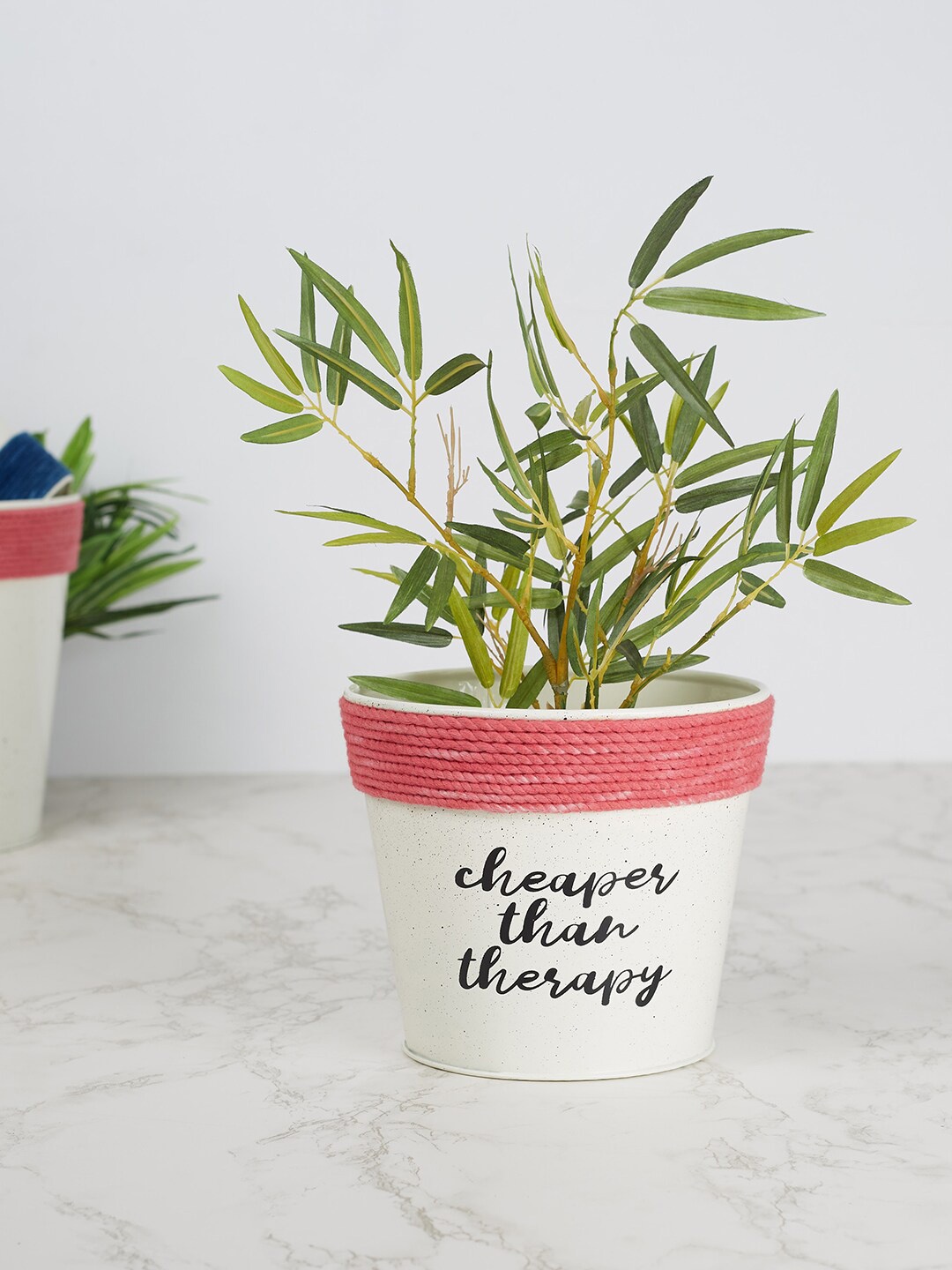 

HomeTown Off-White & Fuchsia Printed Metal Planters