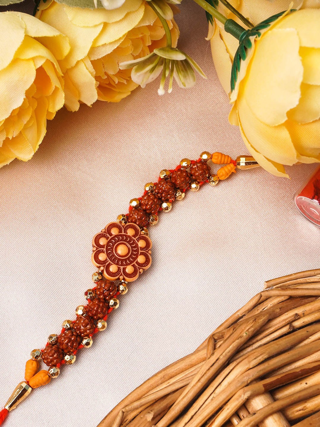

Urmika Red & Gold-Toned Beaded unisexThread Rakhi, Yellow