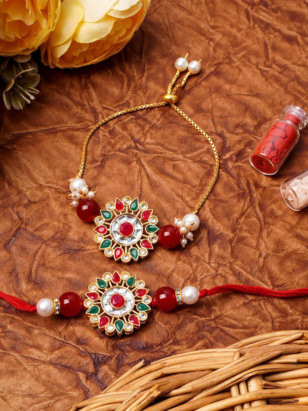 

Urmika Set of 2 Kundan Bhaiya & Bhabhi Rakhi with Roli & Chawal, Red