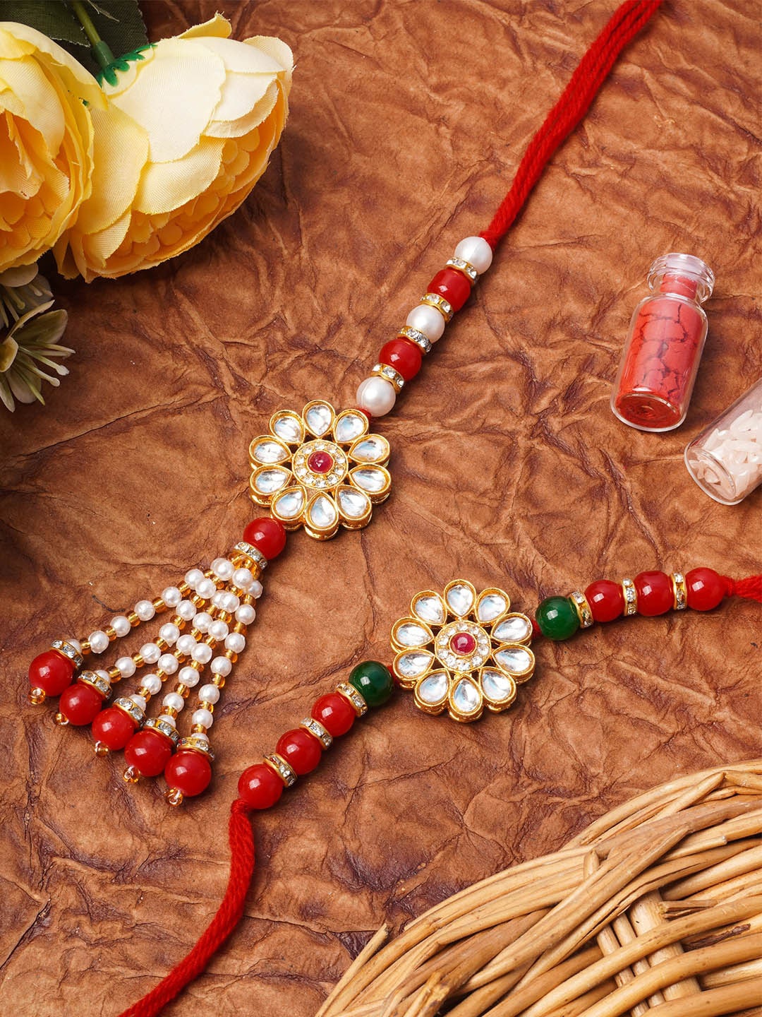 

Urmika Set Of 2 Red & White Kundan Stone Studded Rakhi