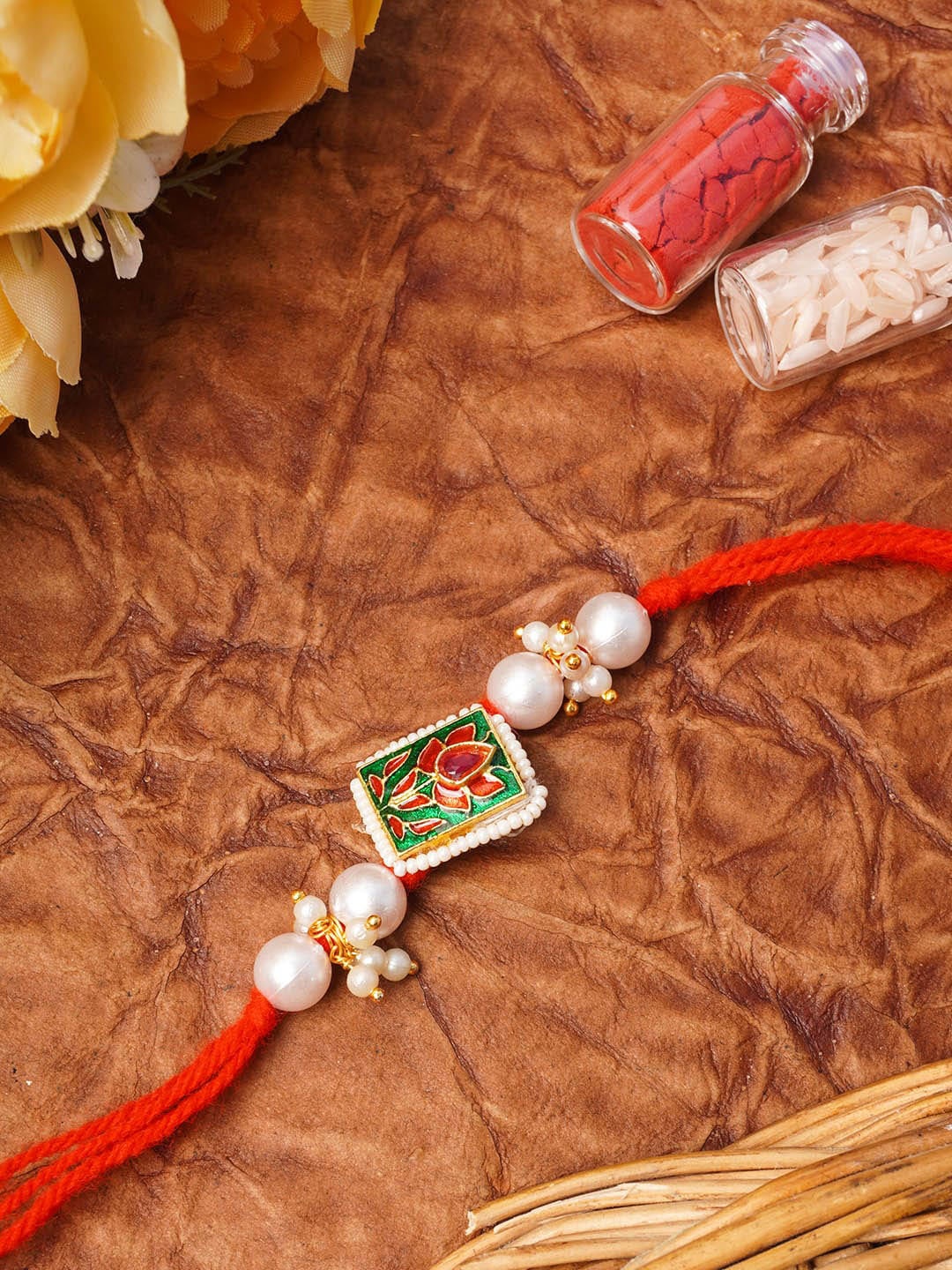 

Urmika Red & Green Beaded Thread Rakhi