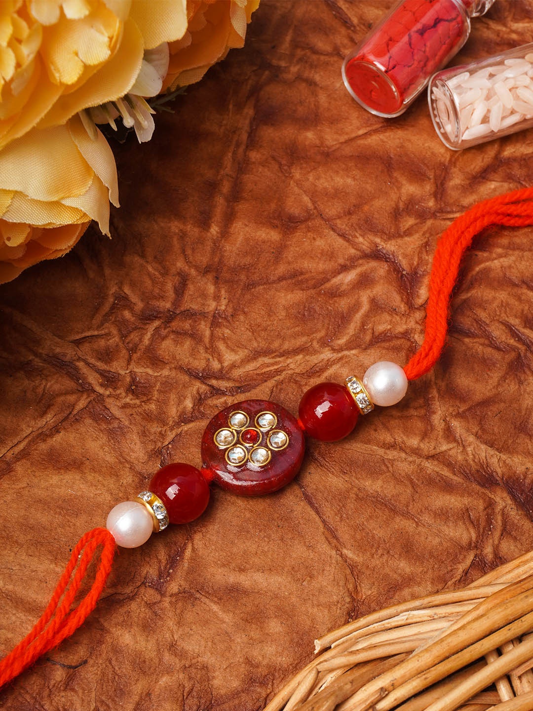 

Urmika Pink Kundan Bhaiya Rakhi for brother with roli & chawal