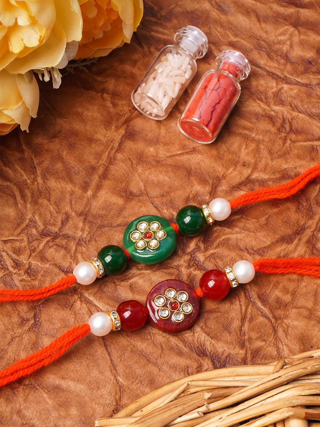 

Urmika Set Of 2 Kundan Rakhi With Roli & Chawal, Red