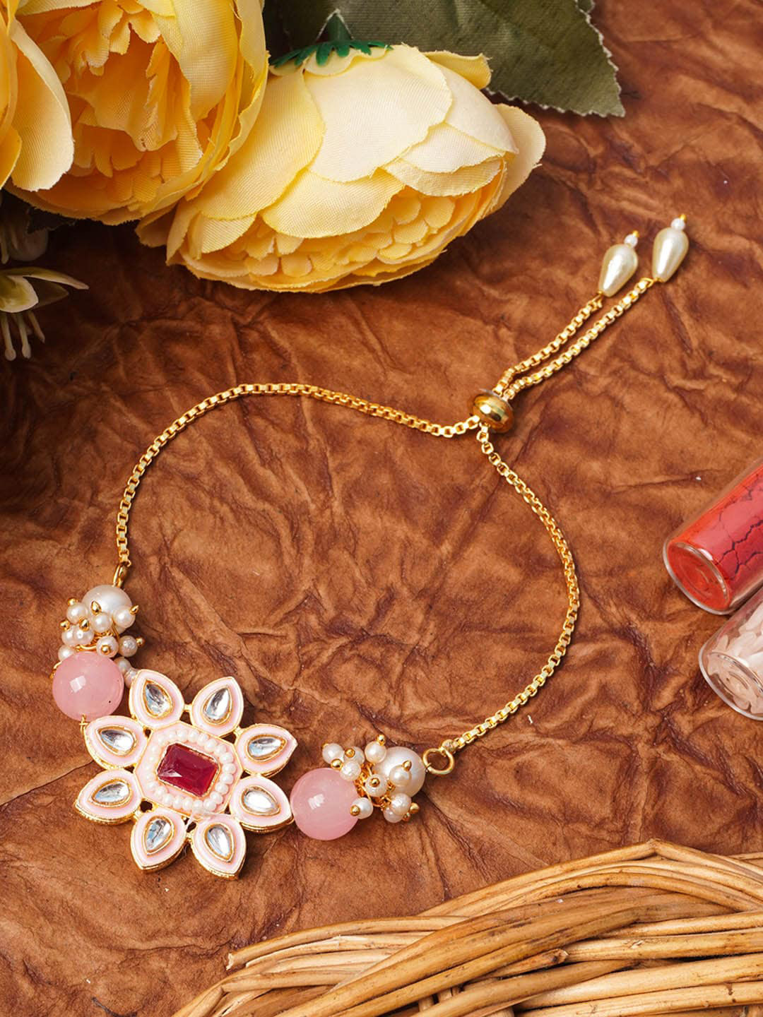 

Urmika Pink Meenakari Kundan Rakhi Set with Roli & Chawal