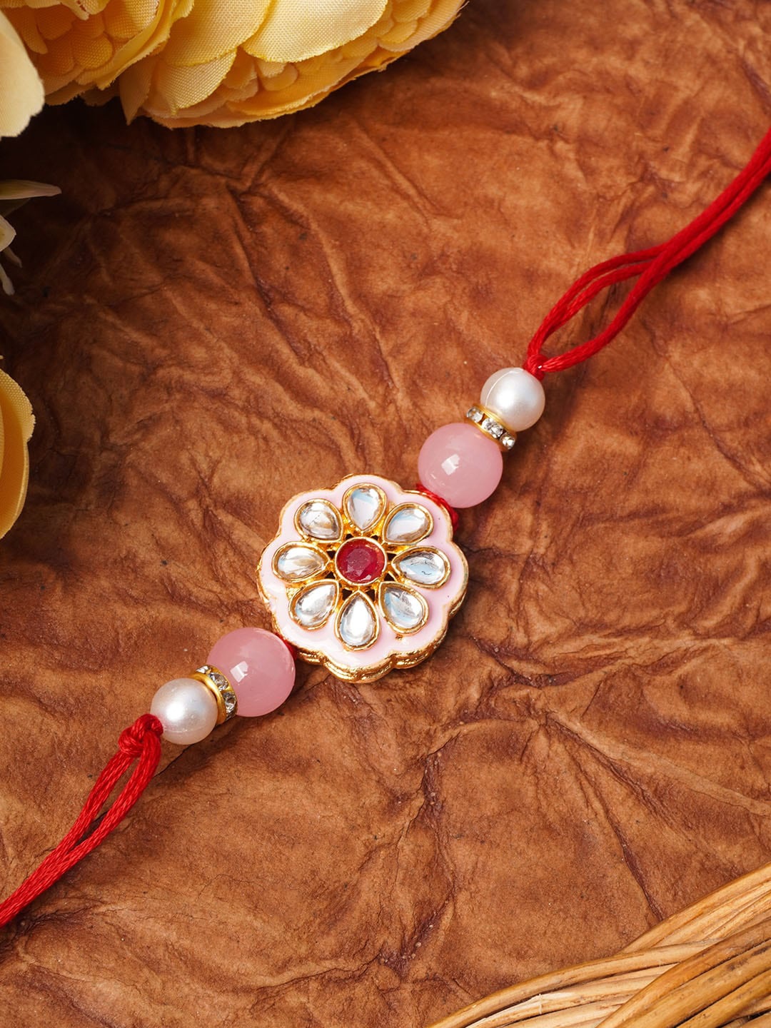 

Urmika Pink & White Meenakari Kundan Rakhi for Brother with Roli & Chawal