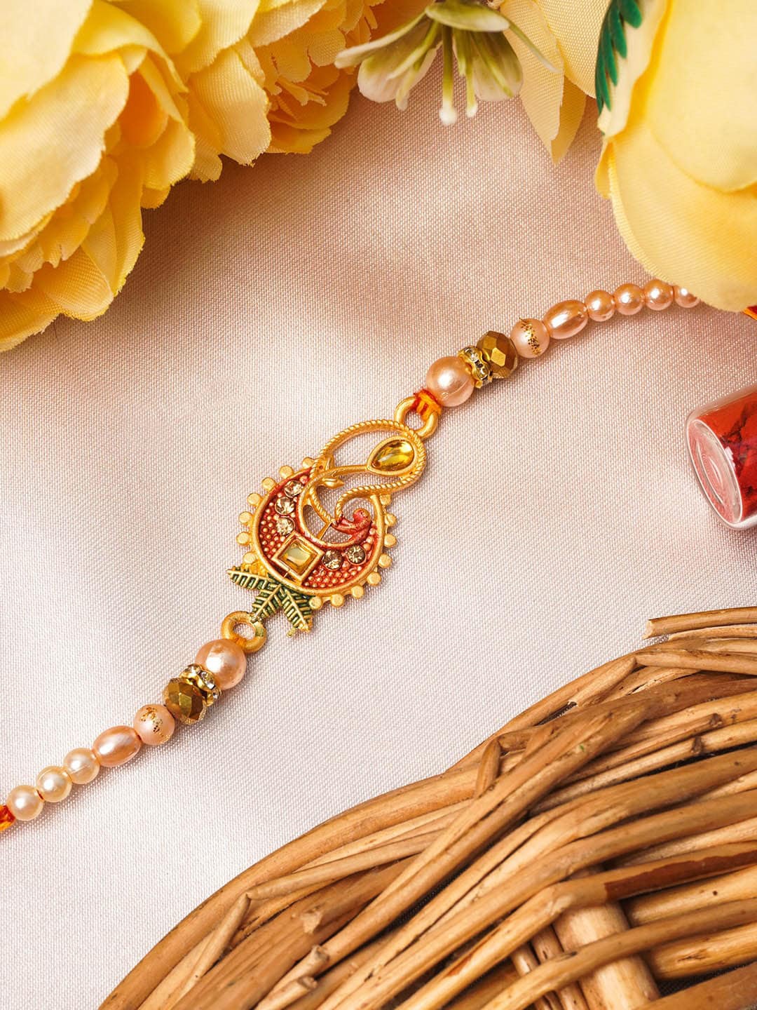 

Urmika Red & Gold-Toned Moon Beaded Thread Rakhi