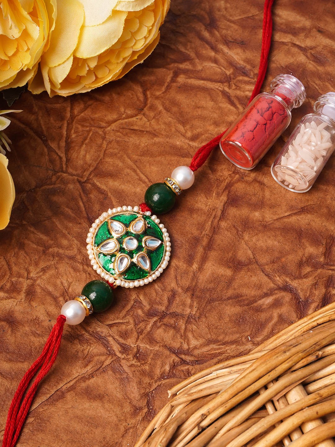 

Urmika Green & Red Meenakari Kundan Rakhi With Roli & Chawal