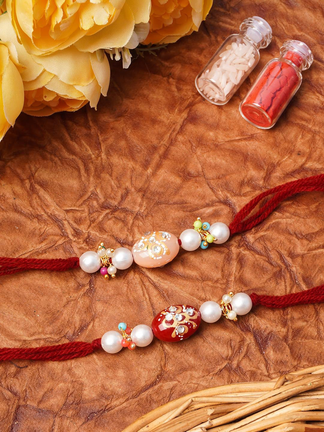 

Urmika Set of 2 Red & White Beaded Thread Rakhi
