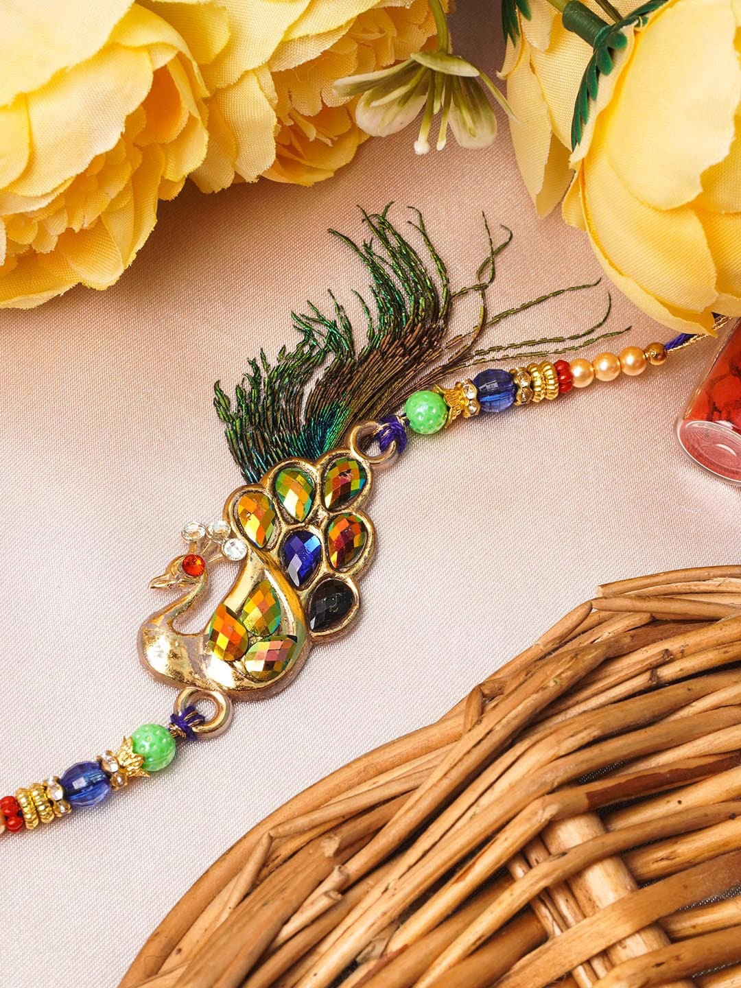 

Urmika Red & Blue Peacock Stone Rakhi