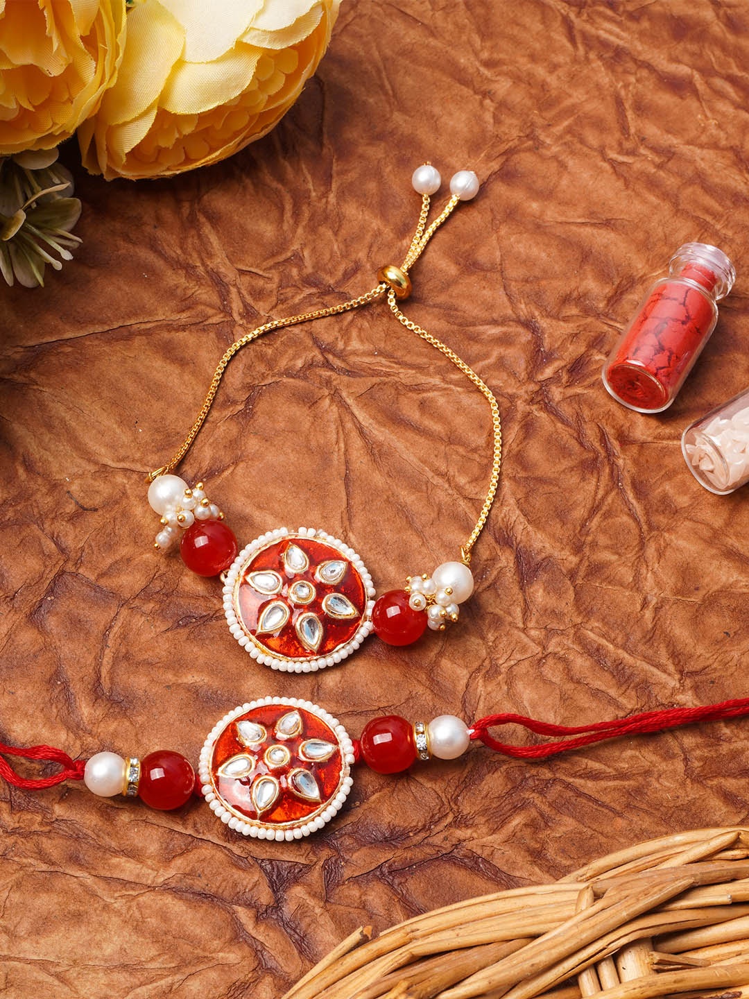 

Urmika Pink Meenakari Kundan Bhaiya Bhabi Rakhi Gift Set