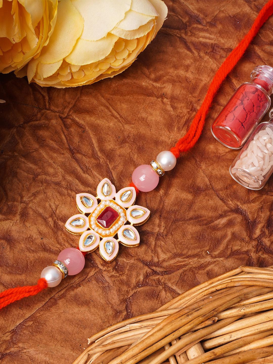 

Urmika Pink & Gold-Toned Beaded Thread Rakhi