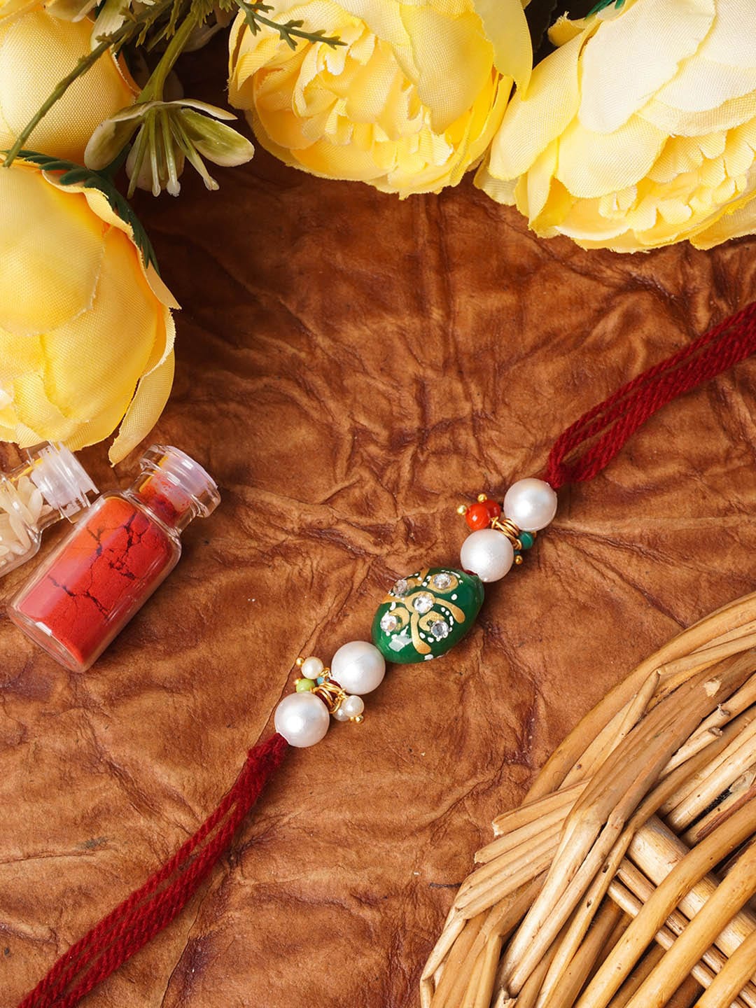 

Urmika Pink Pearl Beads Rakhi for brother with roli & chawal