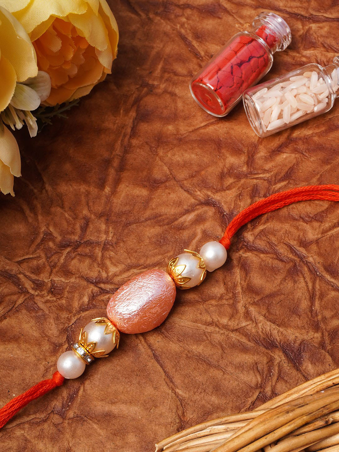 

Urmika Yellow Pearls Beaded Rakhi Gift Set