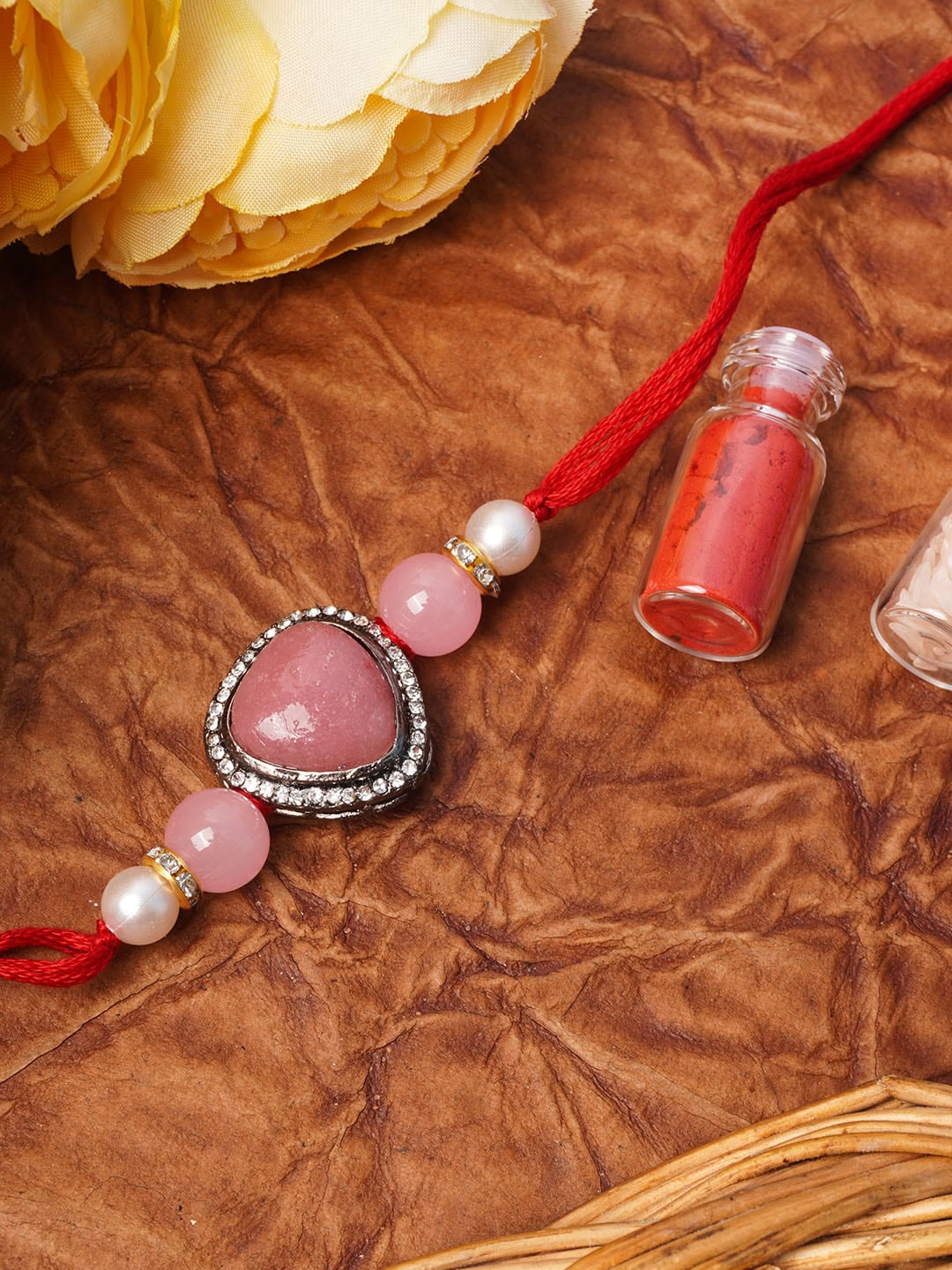 

Urmika Pink Beaded Thread Rakhi