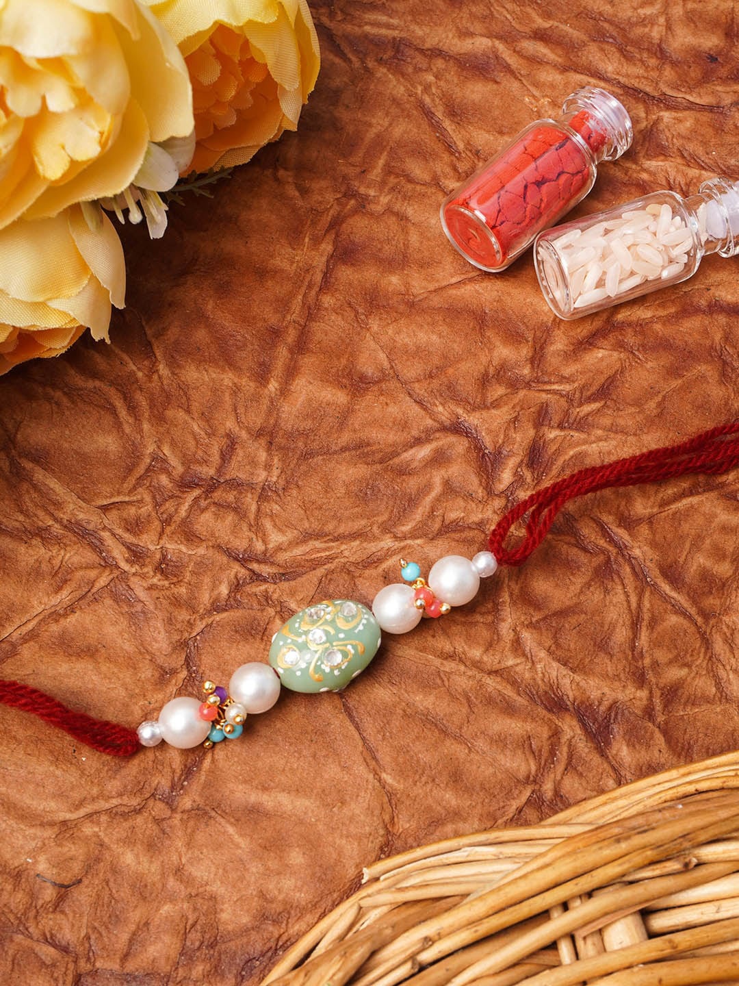 

Urmika Green Pearl & Beads Rakhi for Brother with Roli & Chawal