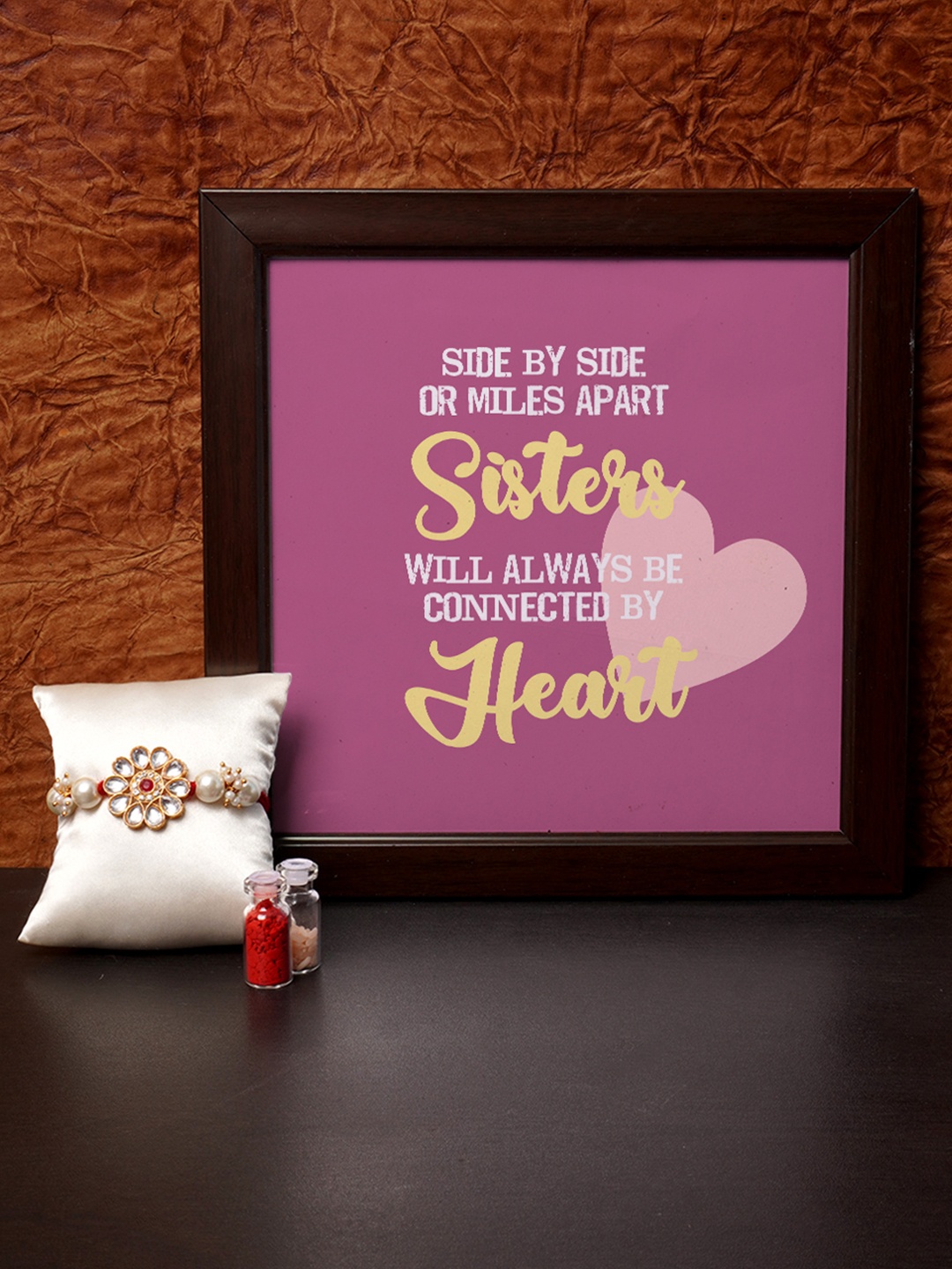 

Crazy Corner Red & Purple Rakhi & Photo Frame Combo with Roli Chawal