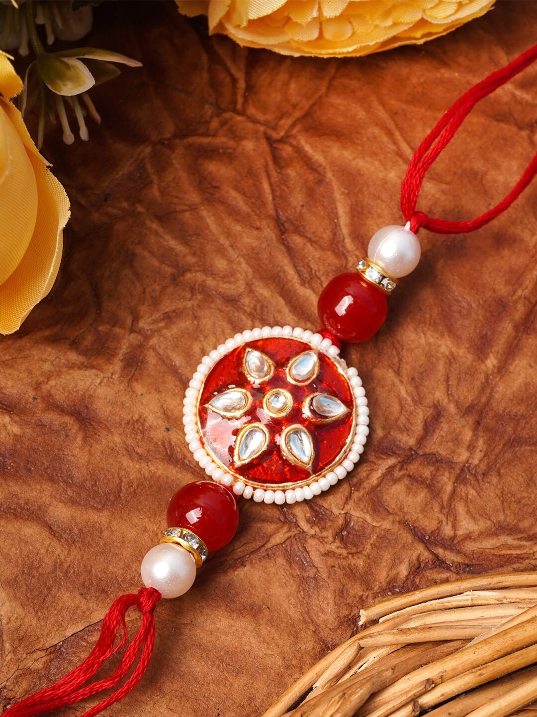 

Urmika Red Meenakari Kundan Rakhi With Roli and Chawal