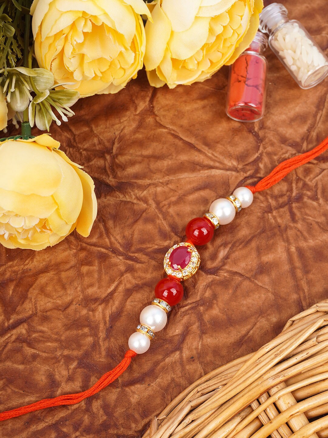 

Urmika Red Ad Studded Rakhi for Bhaiya with Roli and Chawal