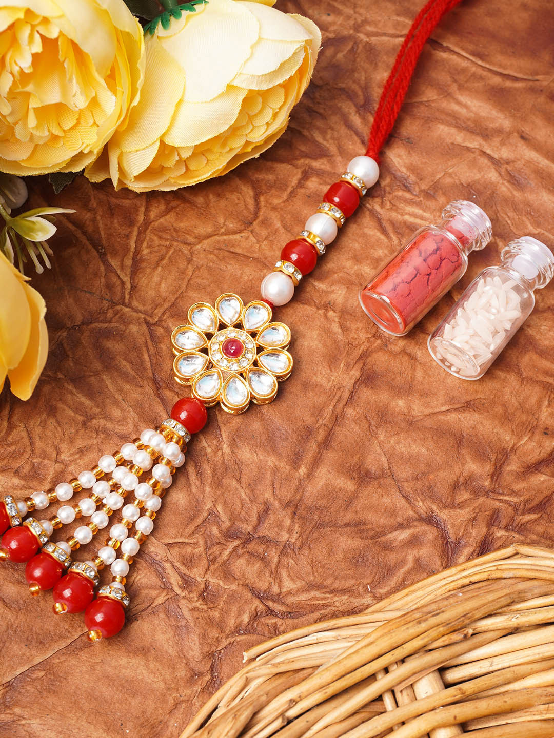 

Urmika Kundan Lumba Rakhi with Roli and Chawal, Red