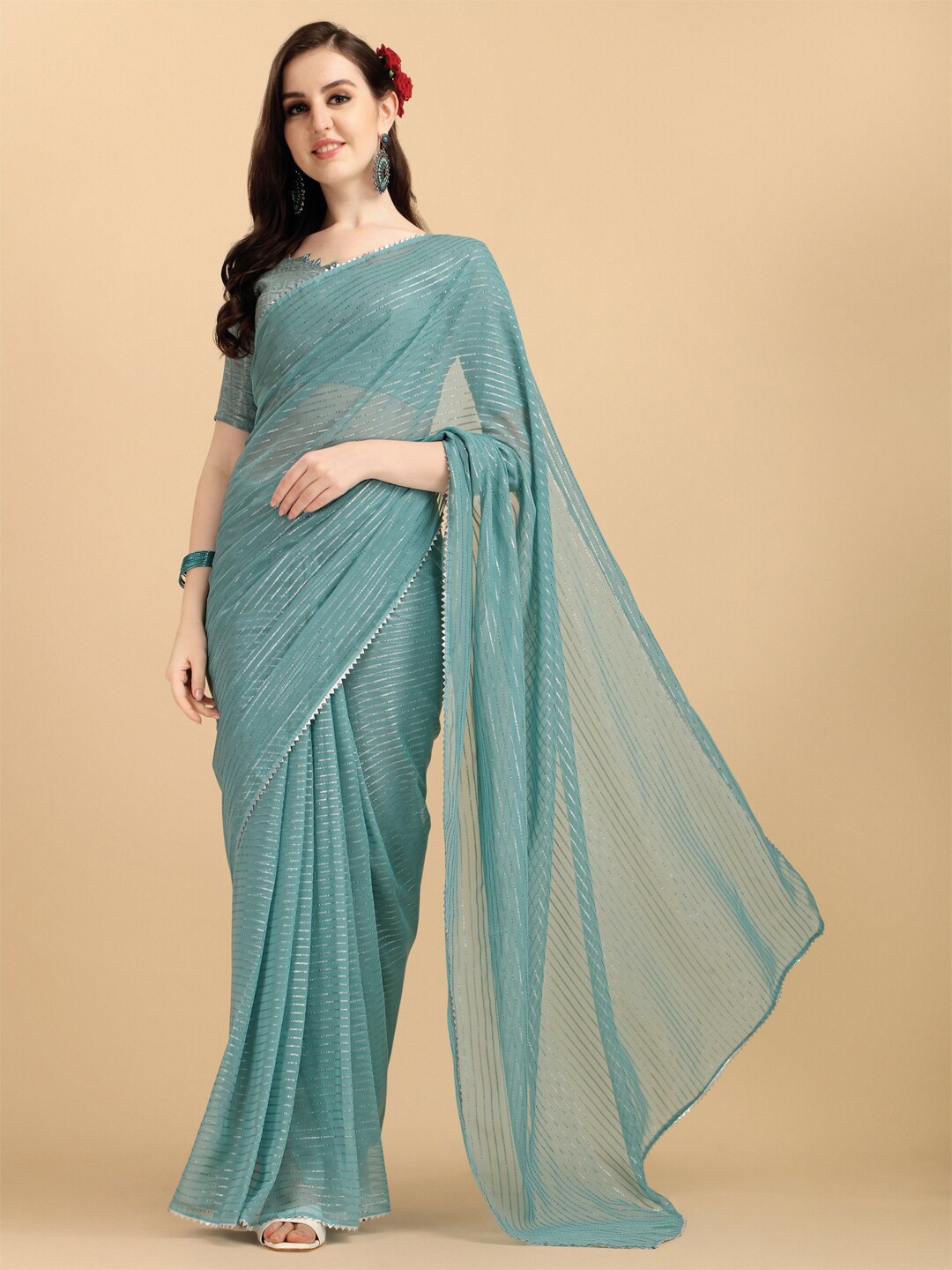 

Sangria Blue Poly Chiffon Embellished Zari Striped Saree