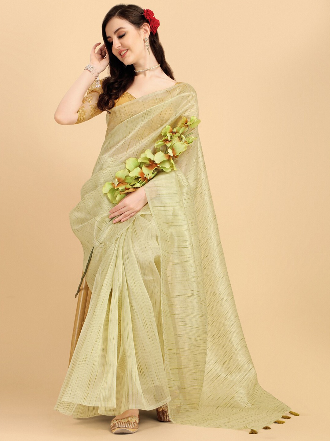 

Sangria Green Cotton Blend Solid Embellished Saree