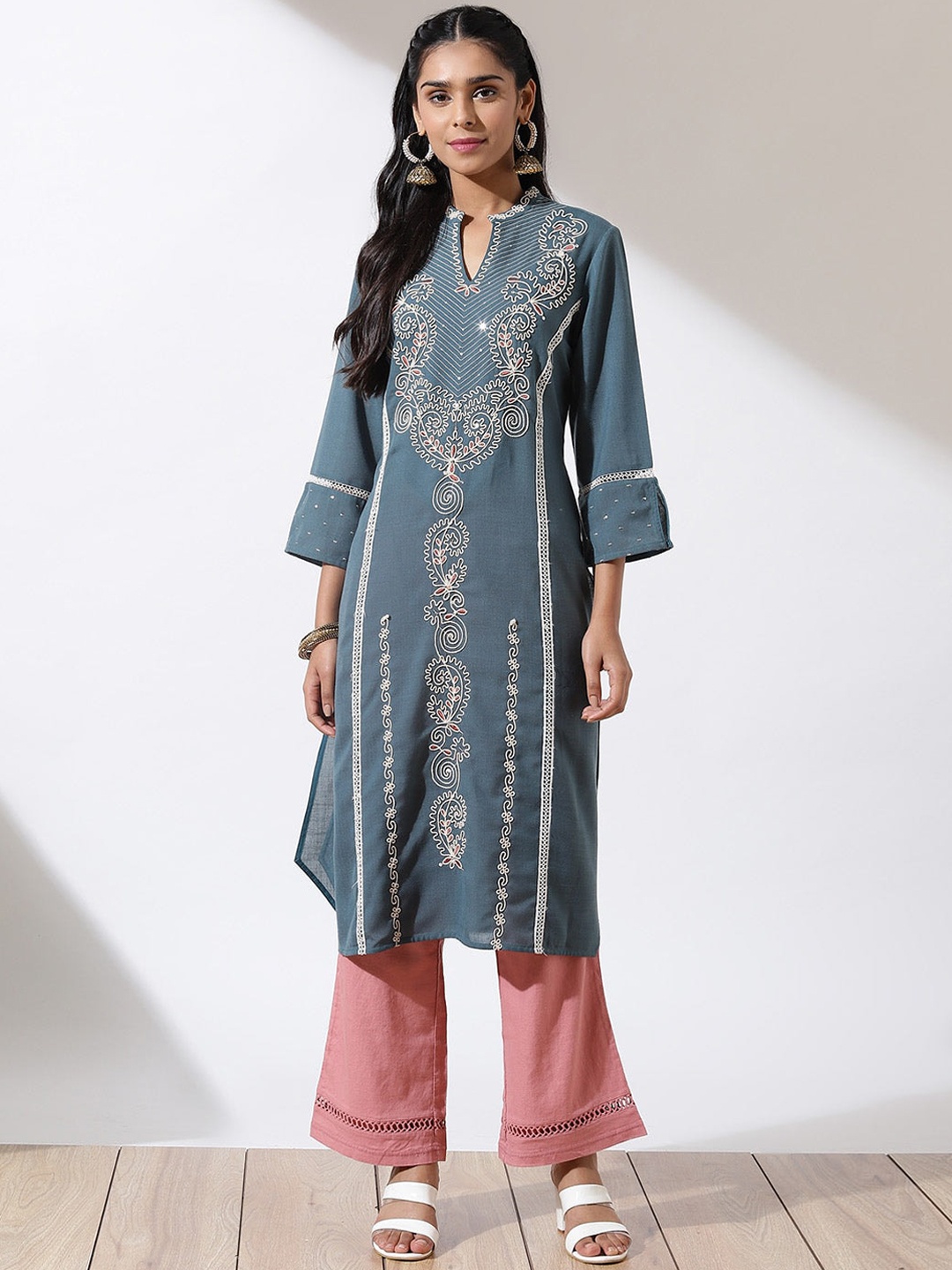 

Lakshita Women Teal Ethnic Motifs Embroidered Flared Sleeves Thread Work Kurta
