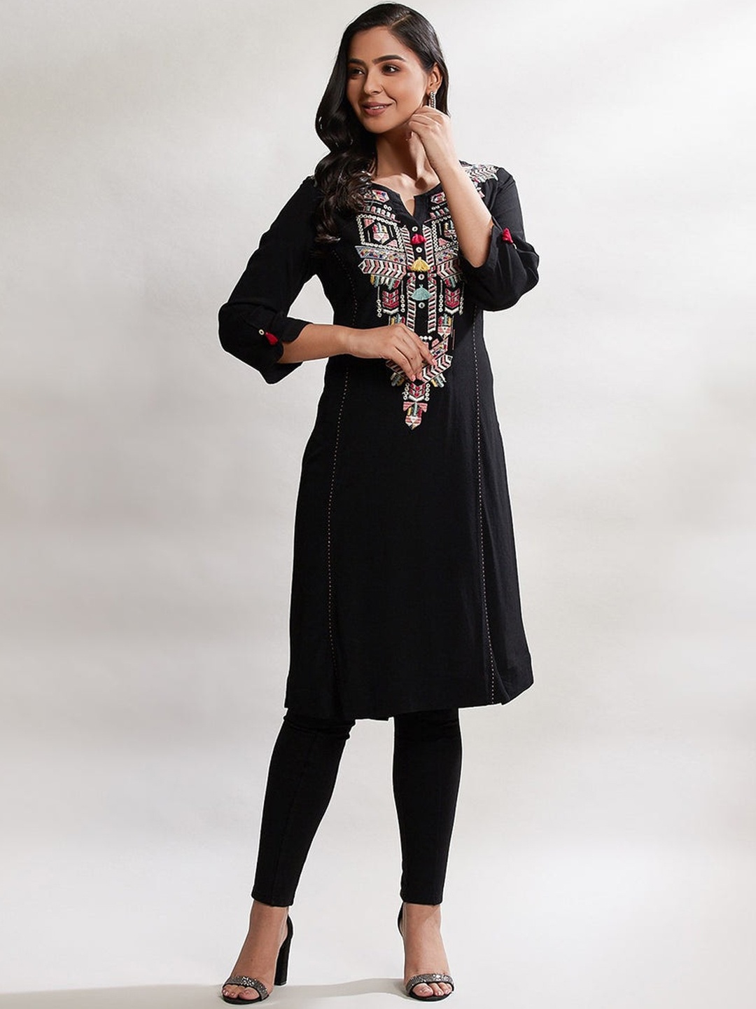 

Lakshita Women Black Floral Yoke Design Flared Sleeves Thread Work Quirky Crepe Kurta