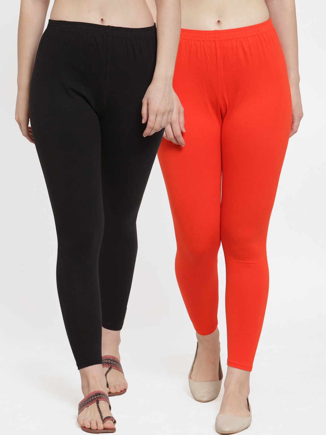 

GRACIT Women Black & Orange Pack Of 2 Solid Leggings
