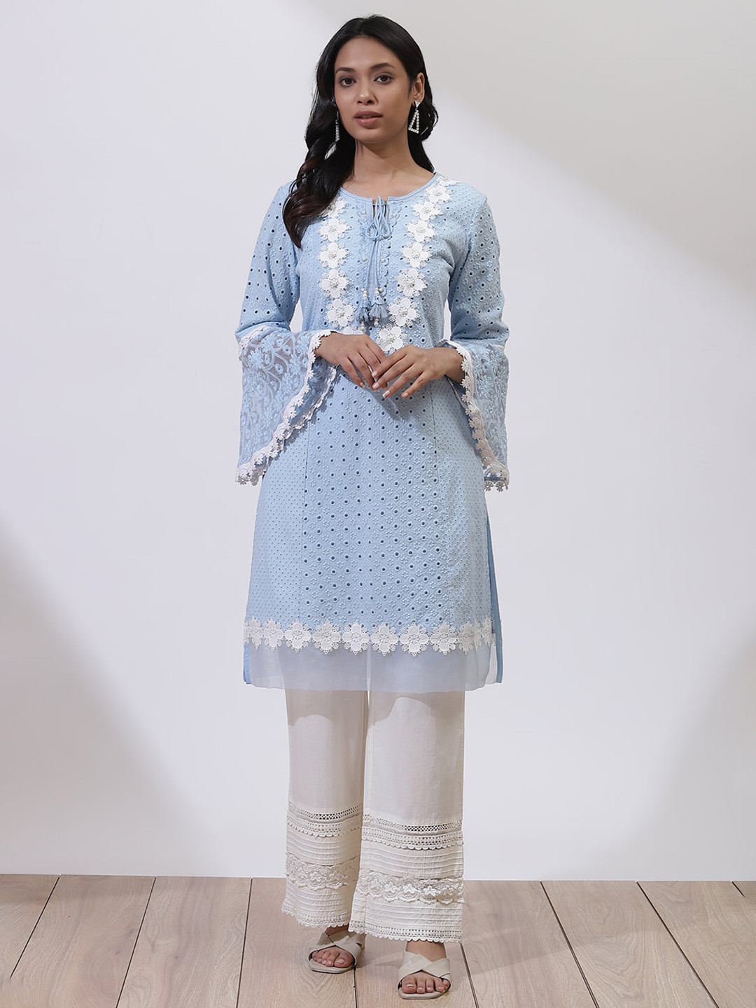 

Lakshita Women Blue & White Floral Embroidered Bell Sleeves Thread Work Floral Kurta