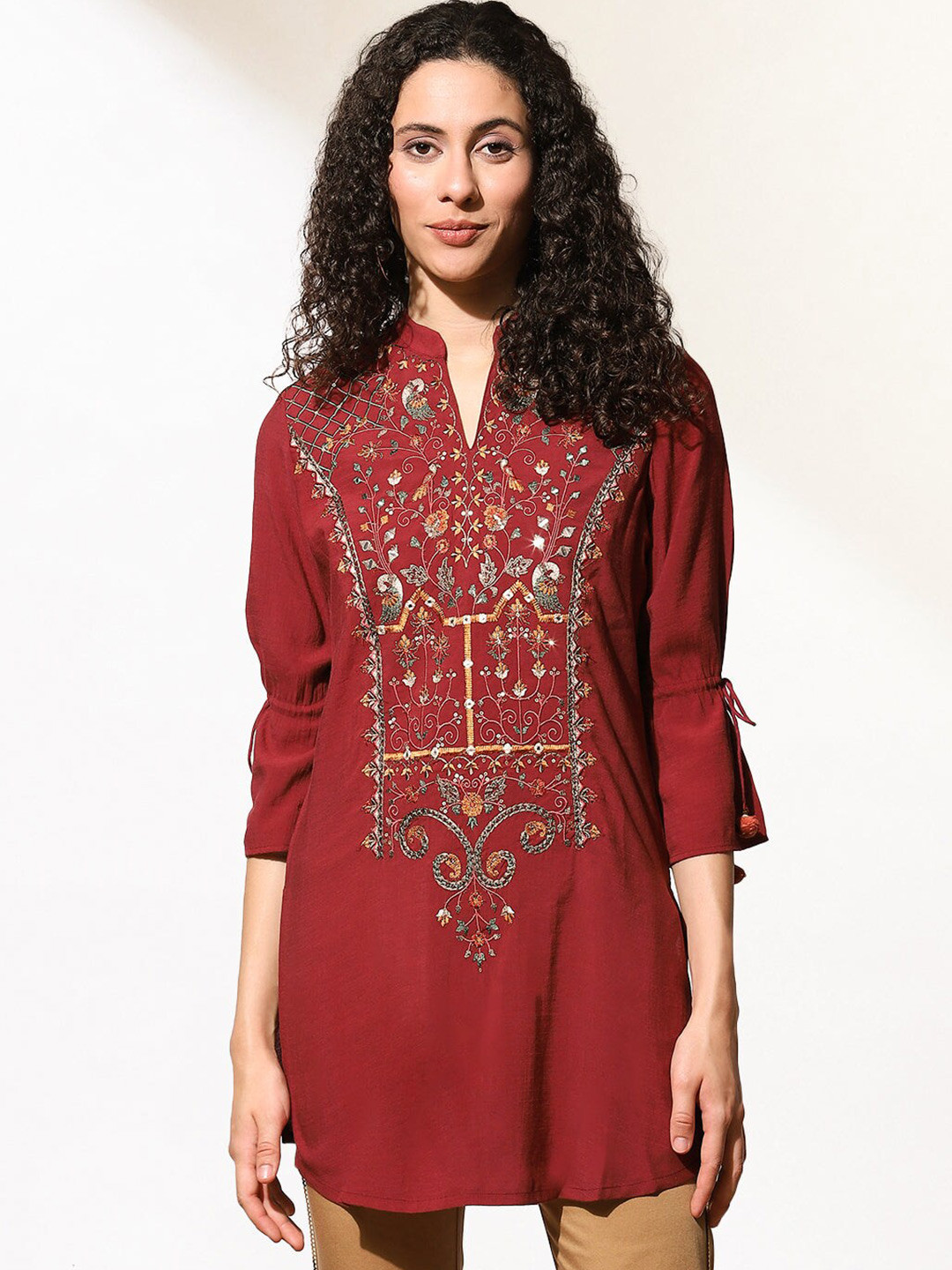 

Lakshita Burgundy & Gold-Toned Floral Embroidered Thread Work Thread Work Kurti