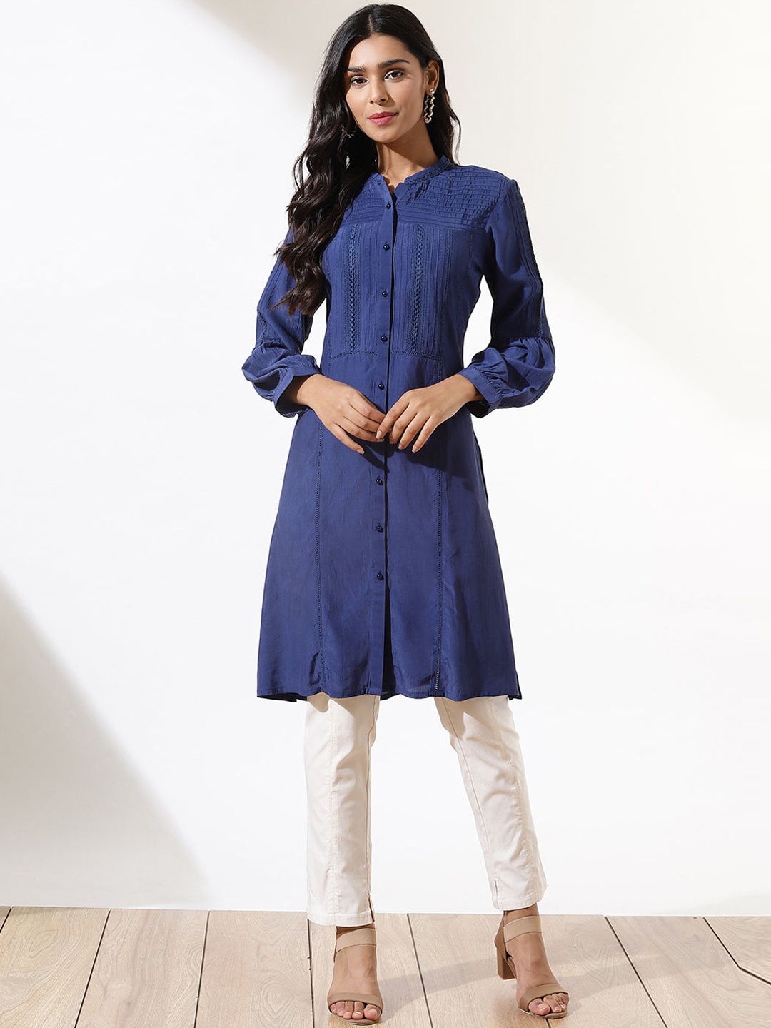 

Lakshita Women Blue Flared Sleeves Thread Work Kurta