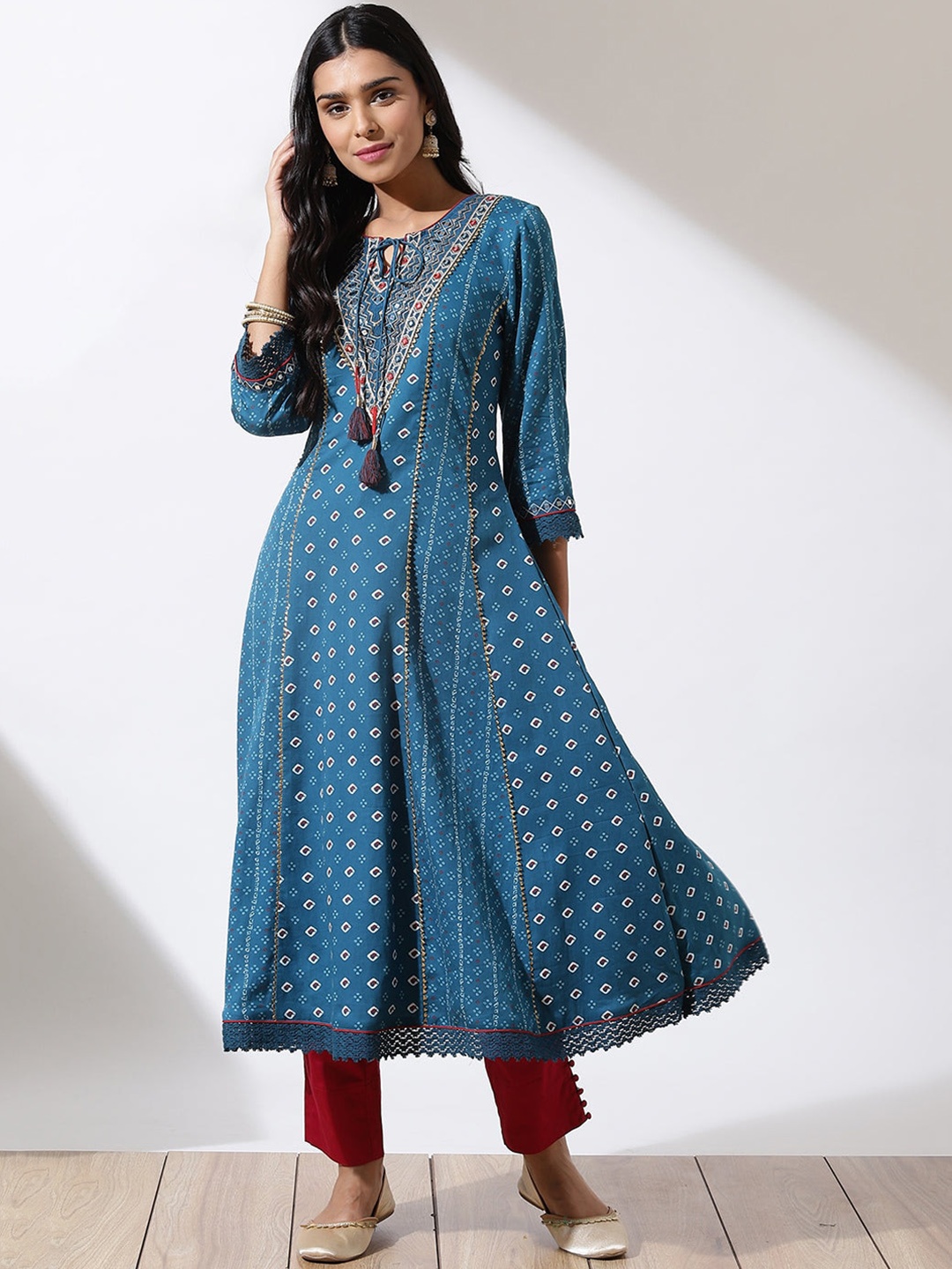 

Lakshita Women Teal Ethnic Motifs Printed Keyhole Neck Thread Work Anarkali Kurta
