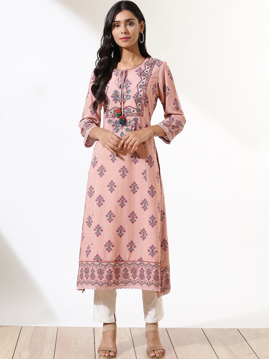 

Lakshita Women Peach-Coloured Ethnic Motifs Printed Keyhole Neck Thread Work Kurta