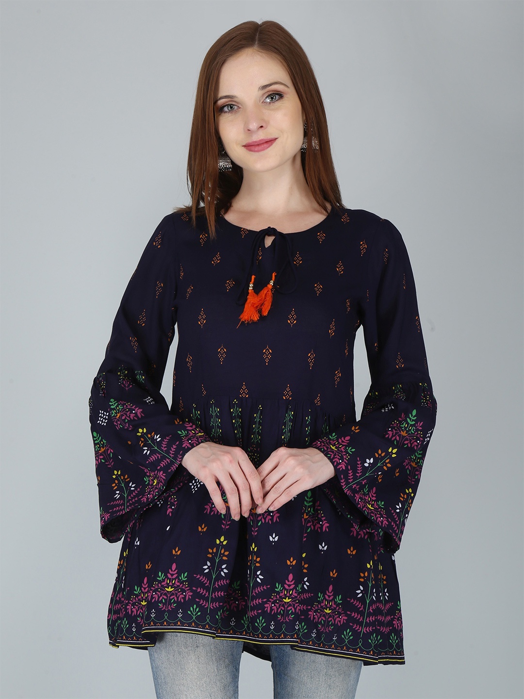 

KALINI Blue Print Indigo Peplum Longline Top