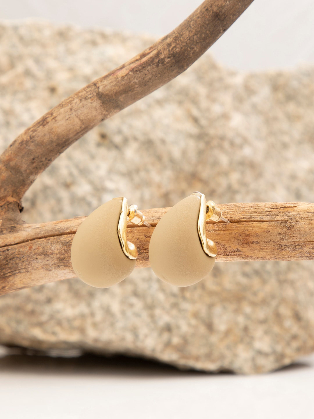 

SOHI Brown Gold-Plated Contemporary Studs Earrings