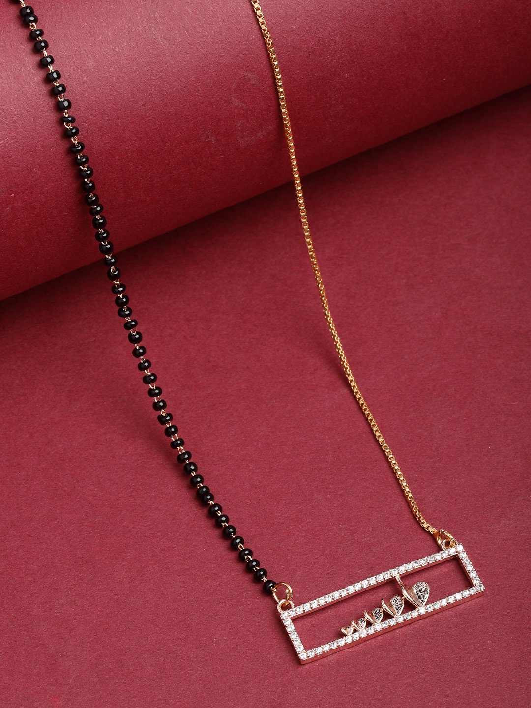 

PANASH Gold-Plated White AD-Studded & Black Beaded Mangalsutra