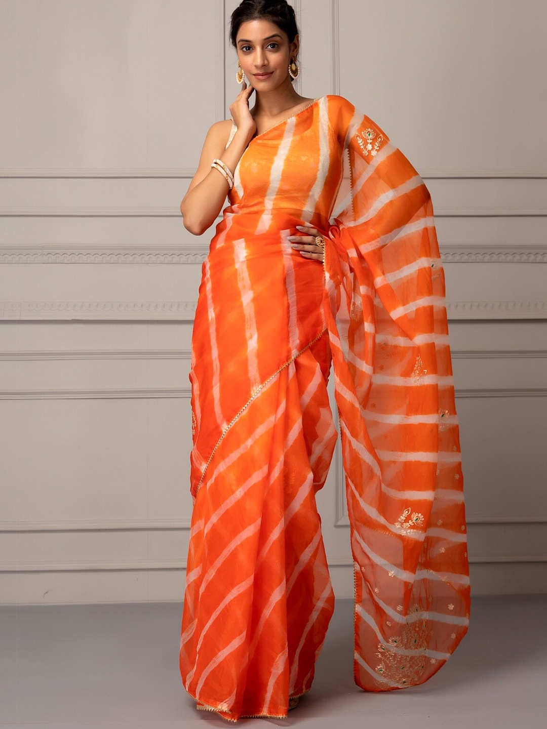 

Geroo Jaipur Orange & White Leheriya Aari Work Organza Leheriya Saree