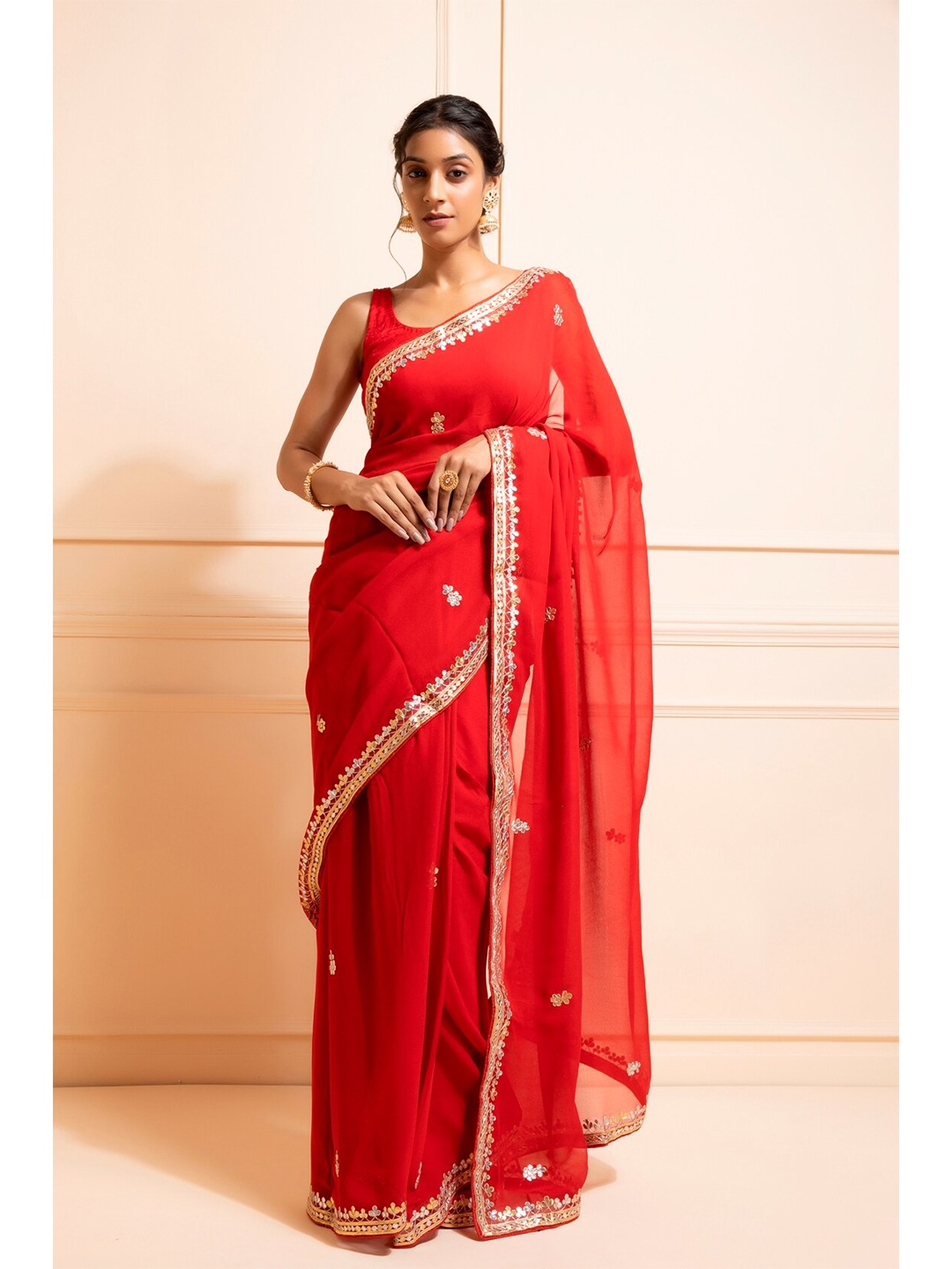 

Geroo Jaipur Red Handcrafted Gota Patti Georgette Saree