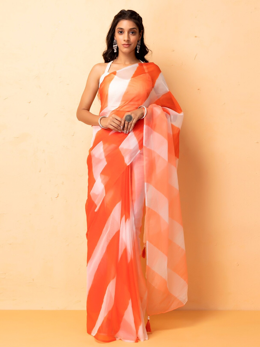 

Geroo Jaipur Orange & White Leheriya Organza Saree