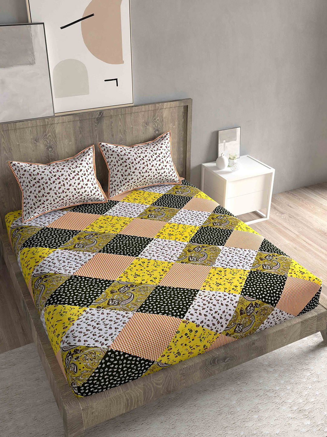 

Spangle Yellow & Off White Floral 260 TC King Bedsheet with 2 Pillow Covers