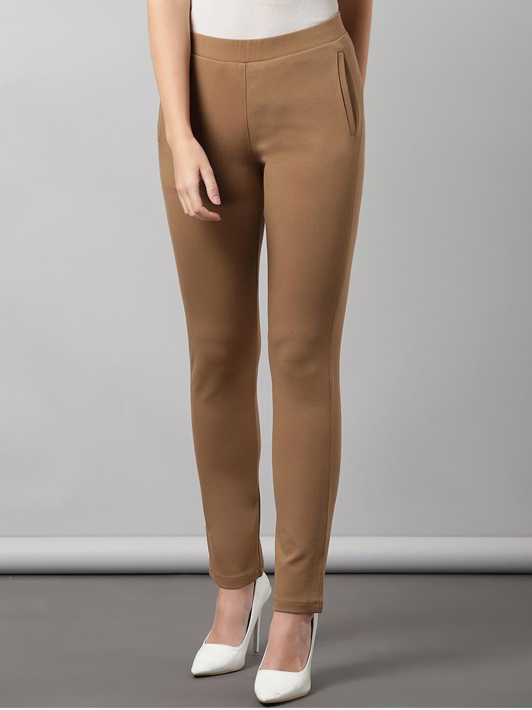 

Lakshita Women Beige Colored Solid Skinny Fit Treggings