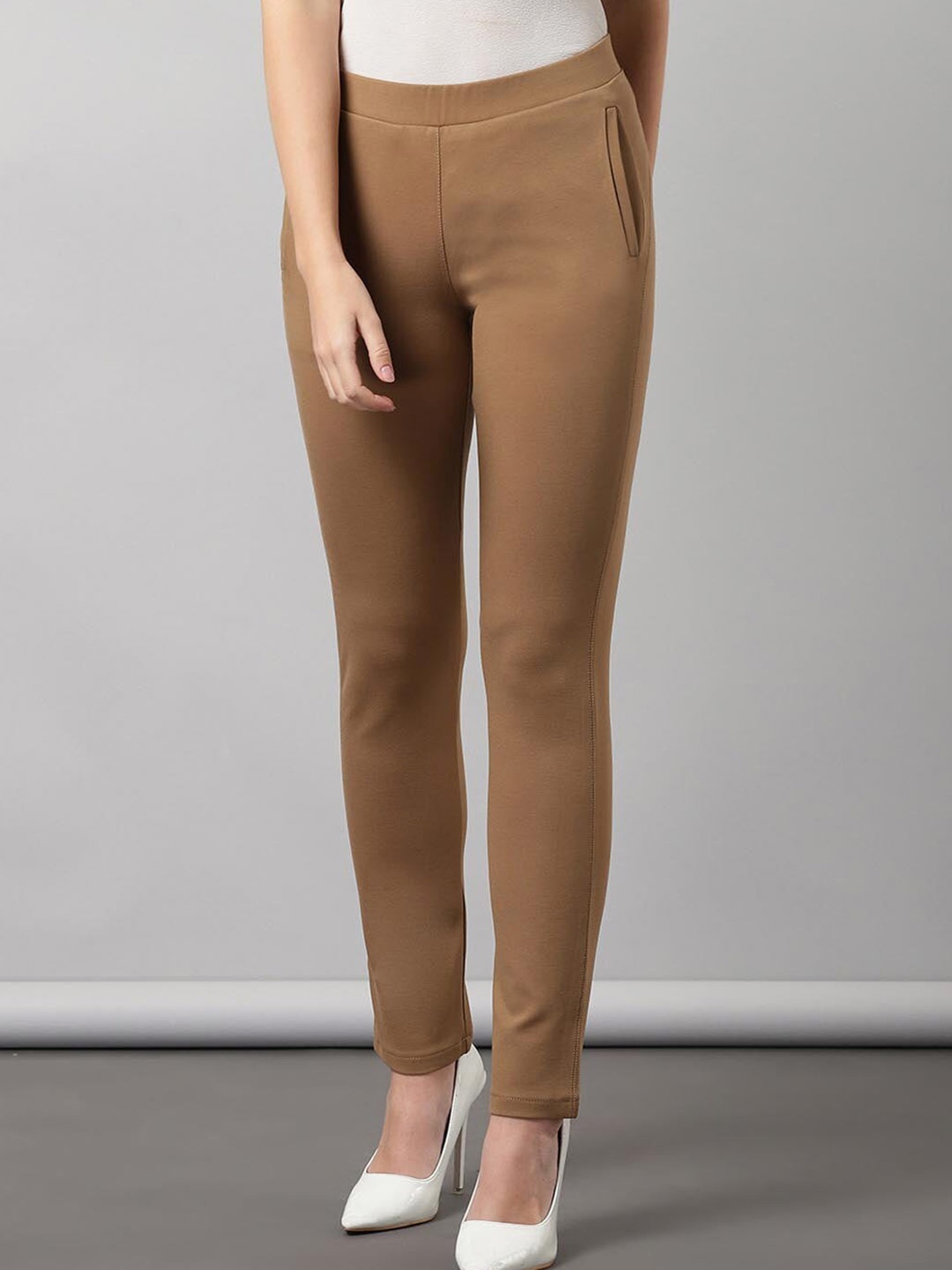 

Lakshita Women Beige Solid Skinny-Fit Jeggings