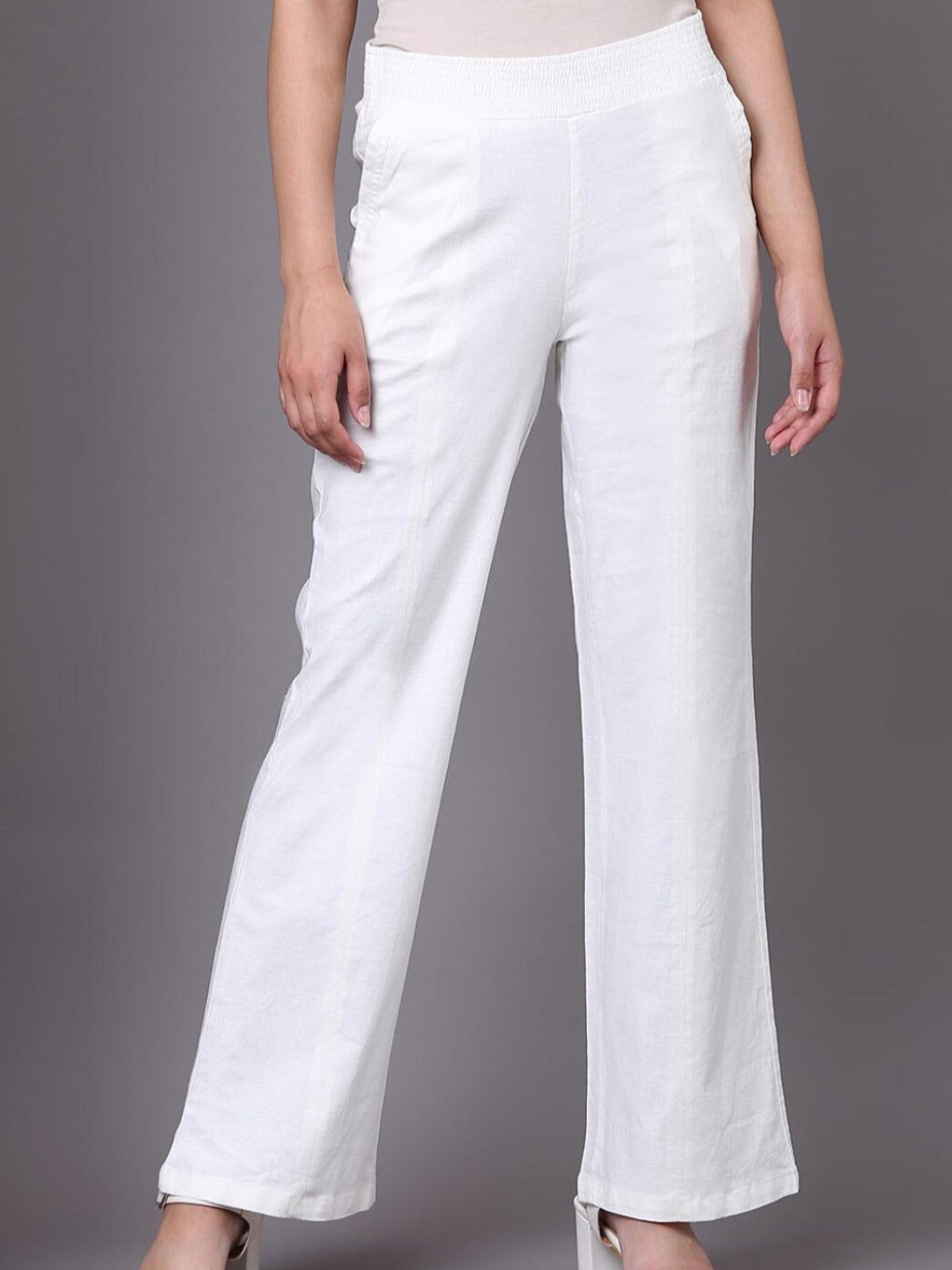 

Lakshita Women White Solid Smart Loose Fit Trousers