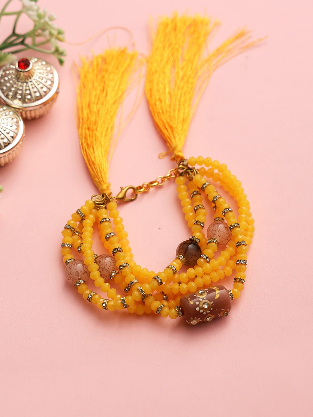 

Aapno Rajasthan Women Yellow Beaded Multistrand Bracelet Rakhi