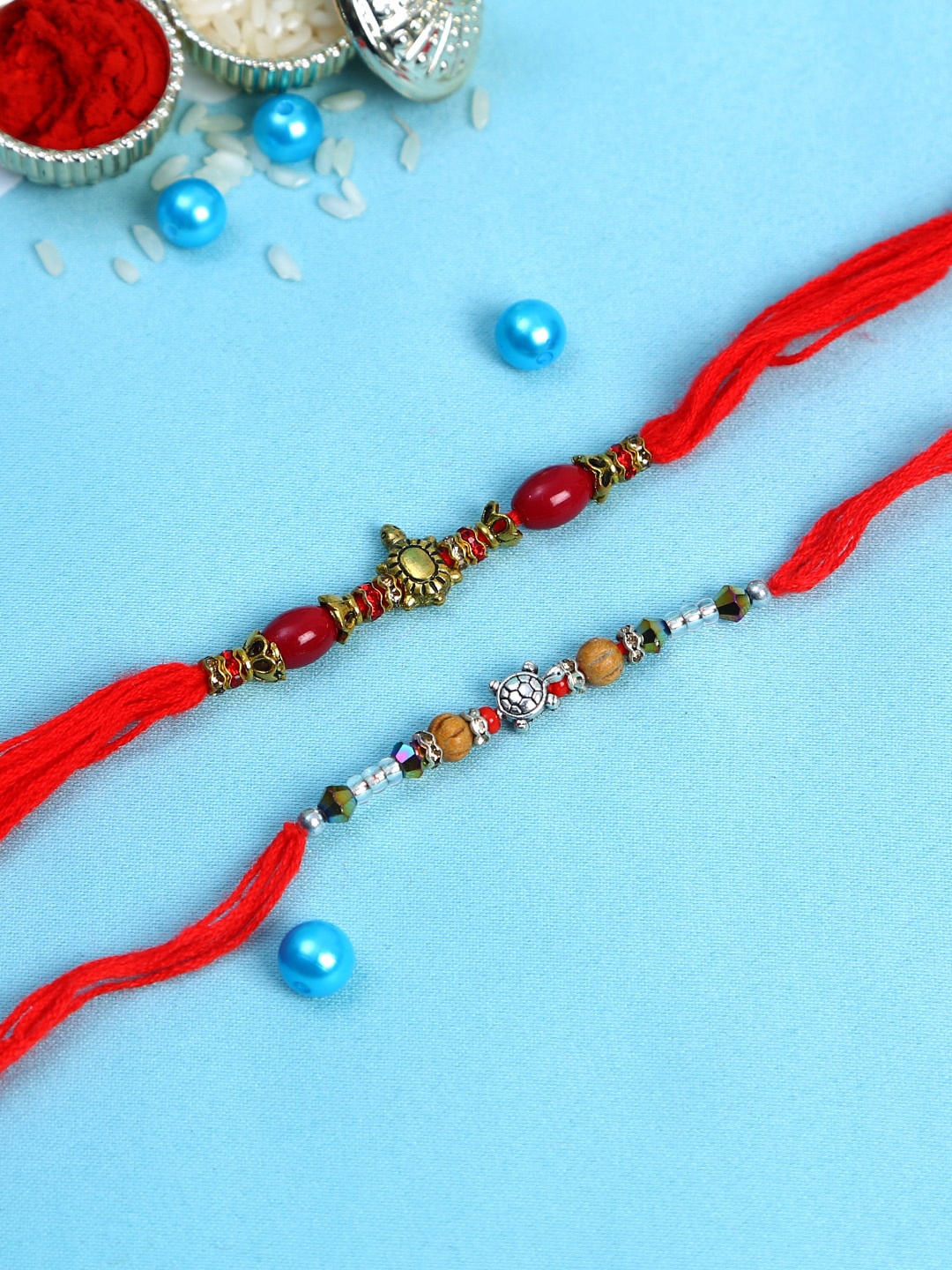 

Aapno Rajasthan Pack Of 2 Red Lucky Charm Rakhi