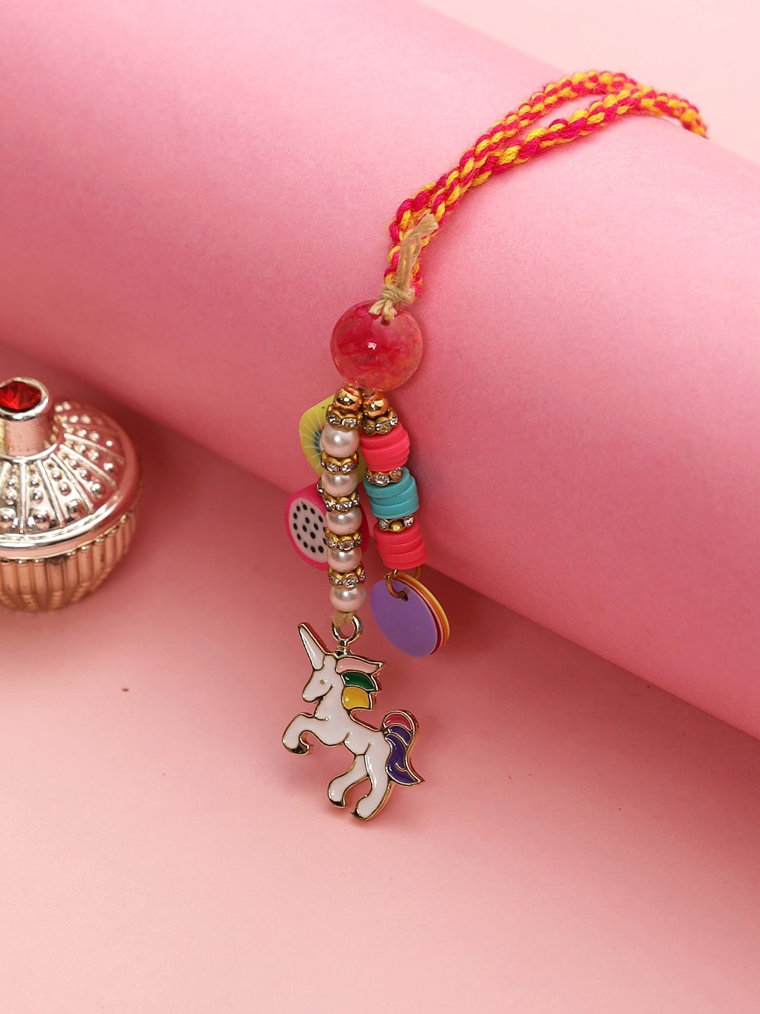 

Aapno Rajasthan Unicorn colorful Lumba Rakhi Pack, Red