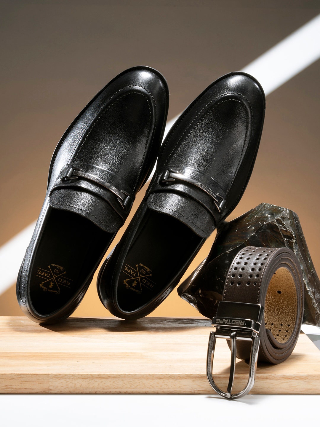 

Red Tape Men Black Solid Formal Loafers
