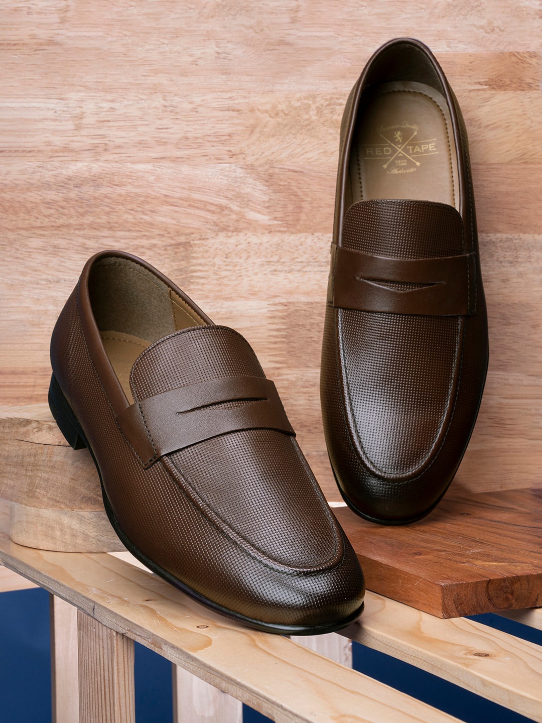 

Red Tape Men Brown Solid Formal Slip-On Shoes