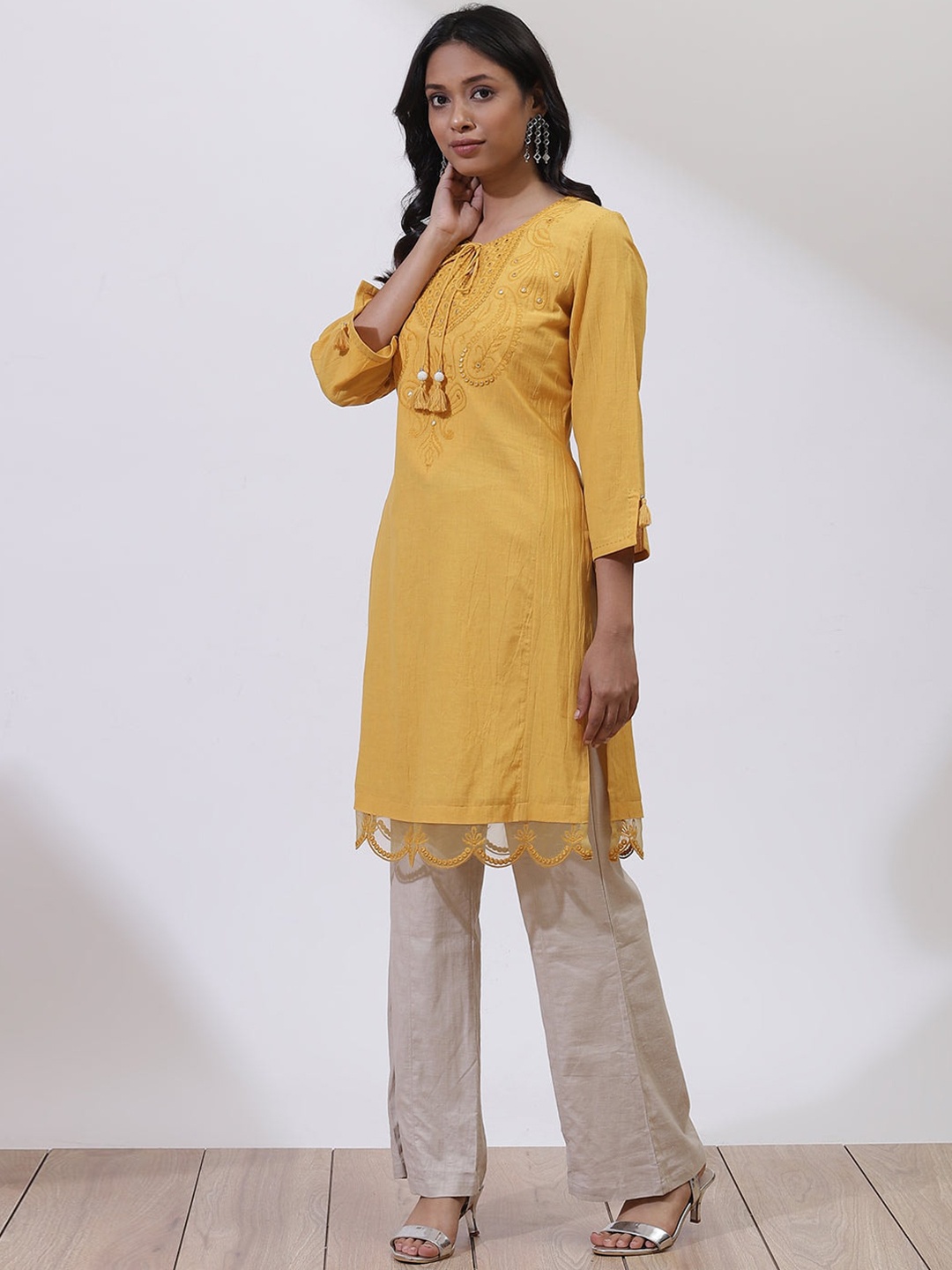 

Lakshita Women Yellow Paisley Embroidered Mirror Work Kurta