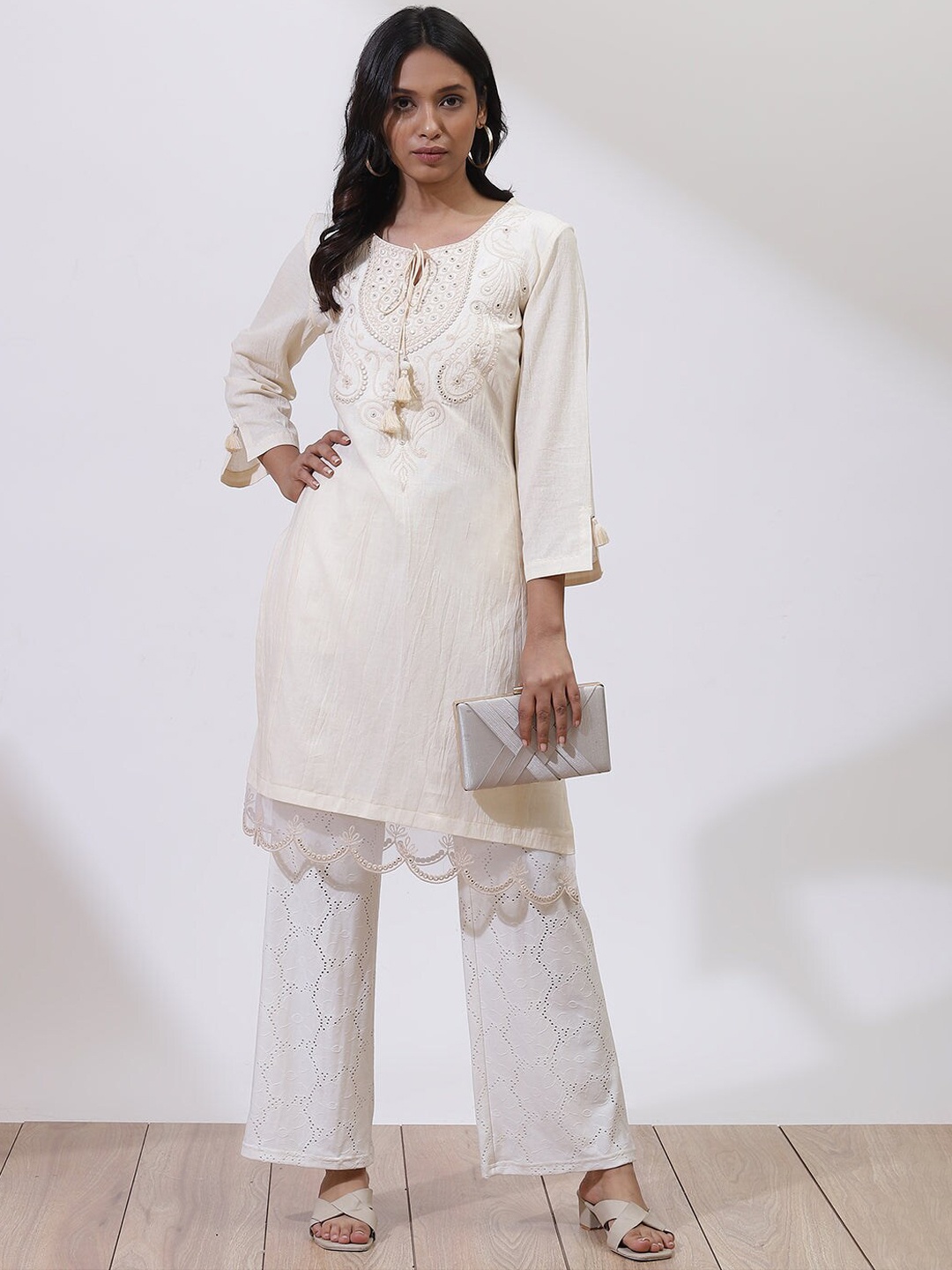 

Lakshita Women White Embroidered Keyhole Neck Kurta